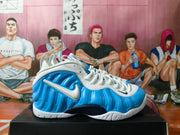 Side profile showing the blue ribbed upper, white overlays, dark blue midsole accent, and white outsole.