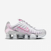 Opposite side view of white and pink Nike Shox TL-style sneaker.