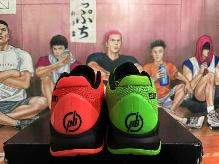 Rear views of red and green Nike basketball shoes with black heel details.