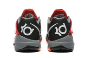 Rear view of black and red Nike KD 4 shoes with gray heels.