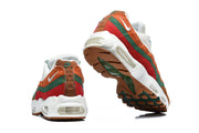 Rear and outsole views of Nike Air Max 95 TT sneakers, showing the colored side panels and Air midsole.