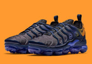 Three-quarter view of the pair showing the laces, molded side overlays, and visible segmented soles.