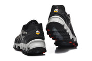 Rear and outsole views of Nike Air Max DN 8 Paris sneakers with white midsoles and red outsole accents.