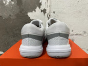 Rear view of white and grey Nike Hyperquick low-top training shoes