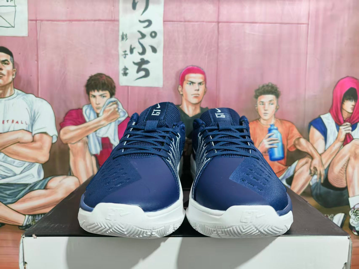 Front view of navy and white Nike basketball shoes