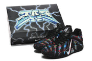 Shoes displayed beside a themed box