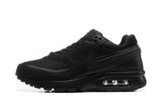 Side view of an all-black Nike Air Max BW sneaker with a visible heel Air unit.