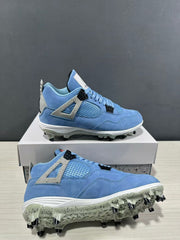Angled view of the sneakers highlighting the blue upper, white midsole, speckled outsole, and black studs.