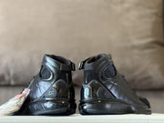 Rear view of the pair showing the heel panels and ankle details.