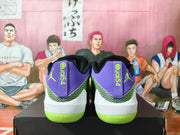 Rear view of purple and neon green Jordan Luka 1 basketball shoes