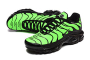 Nike Air Max Plus sneakers in vivid green and black, shown in a side and top view.