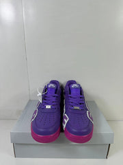 Front view showing the purple perforated toe boxes, laces and branded tongue labels.