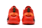 Rear view of the red sneakers showing padded collars, black pull tabs, and molded heel details.