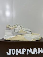 Opposite side profile of the cream and white sneakers with the Swoosh, layered panels, and adjustable strap visible.