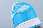 Close-up of the blue heel panel with a white Air Jordan Wings logo.