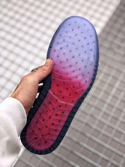 Bottom view showing the translucent outsole with red and purple coloring.