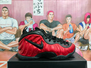 Side profile of a black and red high-top sneaker with a sculpted red upper, black swoosh, and black sole.