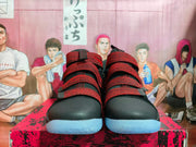 Front view showing the black toe and red woven straps on the Nike LeBron Soldier shoes.