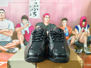 Front view of the pair showing black laces, padded collars, and mesh-like tongue panels.