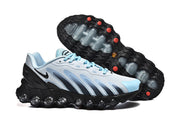 Nike Air Max DN sneaker pair showing the side profile and patterned outsole.