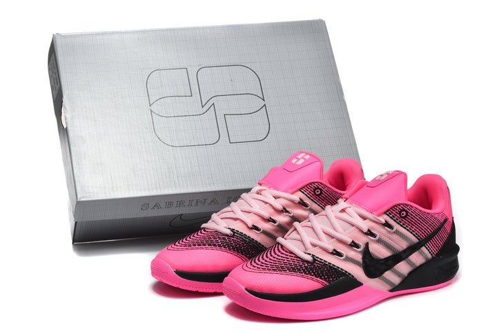 Pink and black Nike Sabrina 2 basketball shoes beside a shoe box