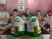 Rear view showing the white heel panels, green outsole, yellow accents and KD-related heel markings.