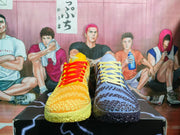 Front-top view of the mismatched pair showing the yellow shoe with red laces and the blue shoe with yellow laces.