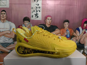 Side view of a yellow sneaker showing the low-top profile, red side tag, patterned lining, and translucent graphic midsole.