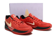 Pair of red and black Nike Ja 2 shoes displayed in front of a shoe box