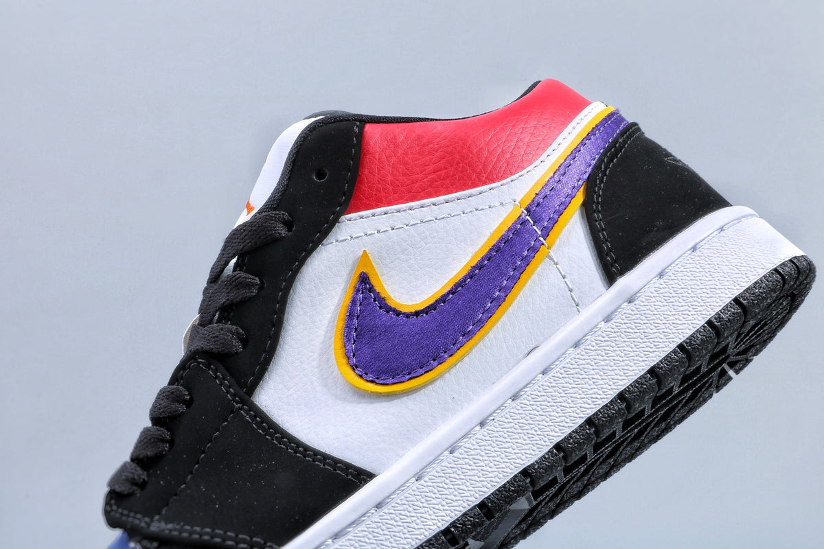 Close-up view of a Jordan 1 Mid-style sneaker showing purple and yellow side detailing, a white panel, black overlays, and a red collar.