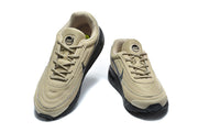 Top view of a pair of tan and black Nike Air Max sneakers.