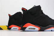 Side profile of the black high-top sneaker with perforated panels, infrared midsole accents and translucent outsole sections.