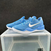 Pair of blue and white low-top basketball shoes