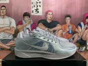 Side view of a light blue Nike basketball shoe showing the side logo and textured panels.
