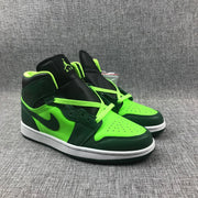 Pair of dark green and fluorescent green Jordan 1 Mid sneakers shown from a front three-quarter angle.