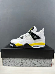 Side profile of a white Jordan Air Jordan 4 sneaker with yellow midsole accents, black lace wings, and a visible heel air window.