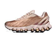 Side view of a rose-gold Nike Air Max DN 8 sneaker with pale accents and a sculpted sole.