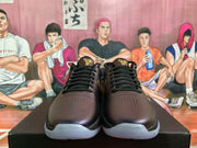 Front view showing dark purple perforated toe boxes, black laces, and translucent outsoles.
