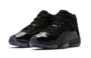 Studio three-quarter view of a pair of black high-top sneakers.