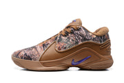 Side profile showing the brown midsole, woodland camouflage upper, and purple accent logo.
