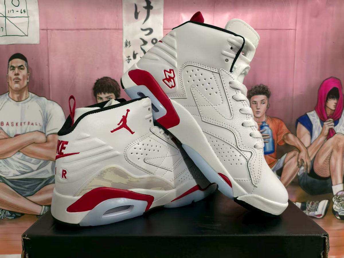 Pair of white high-top Jordan sneakers with black and red accents shown from an angled side view.