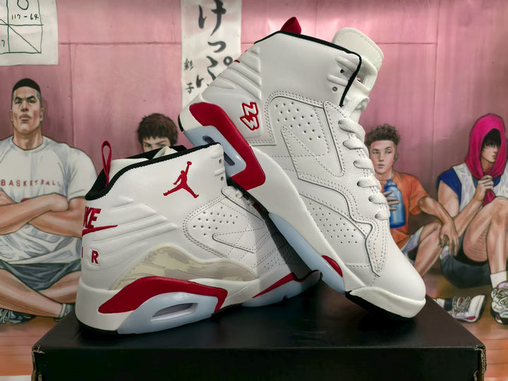 Pair of white high-top Jordan sneakers with black and red accents shown from an angled side view.