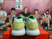 Rear view showing the heel panels and ridged soles