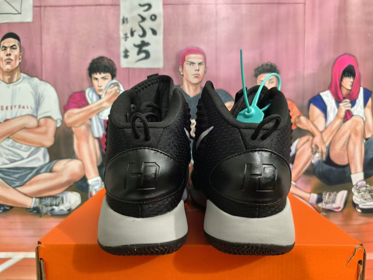 Rear view of black and grey high-top Nike basketball shoes
