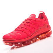 Red Nike sneaker shown at an angle against a white background.