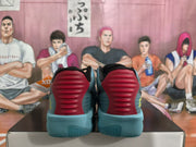 Rear view highlighting the red ribbed heel sections and blue outsoles.