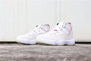 Three-quarter front view of the white high-top sneakers.