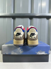 Rear view of the pair showing Jordan and Nike Air branding with patterned heel panels.