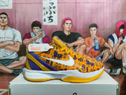 Side view of a yellow and purple Nike basketball shoe showing the patterned upper, side branding, and Zoom lettering on the midsole.