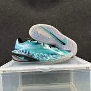 Iridescent basketball shoe with a second shoe showing the patterned outsole